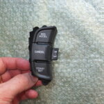 BOTONERA IZQUIERDA DEL VOLANTE 95510-1D000 - 201003560 KIA CARENS III (2006-2013)